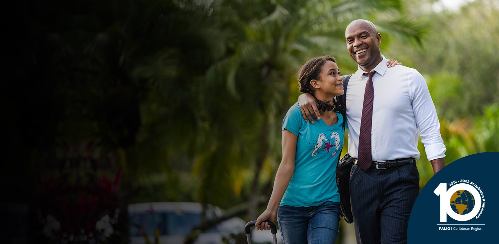 Caribbean dad and daughter walking through the driveway